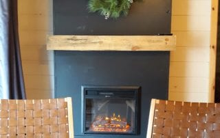 Minnesota Ridge Cabin fireplace and chairs